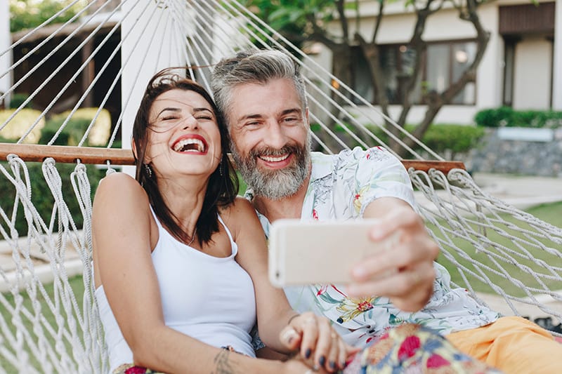 Father and daughter taking a selfie